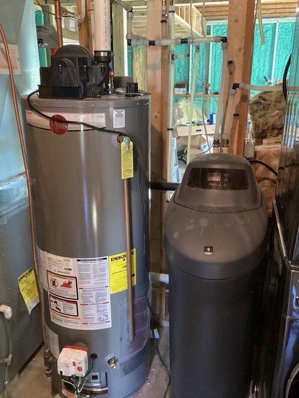 Responded to no hot water complaint on 50-gallon Rheem propane water heater that would not maintain flame after ignition. Customer reported issue began following recent propane gas line replacement after damage. Previous troubleshooting included replacement of flammable vapor sensor and burner assembly with no resolution. Upon inspection, water heater would ignite but flame would immediately extinguish, indicating potential gas supply issue rather than appliance malfunction. Suspected inadequate gas pressure or improper gas/air mixture at burner due to compromised supply line or faulty regulator adjustment. Recommended HVAC technician perform gas pressure testing with manometer to diagnose supply line pressure and regulator function before further water heater component replacement.