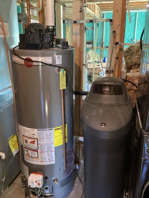 Responded to no hot water complaint on 50-gallon Rheem propane water heater that would not maintain flame after ignition. Customer reported issue began following recent propane gas line replacement after damage. Previous troubleshooting included replacement of flammable vapor sensor and burner assembly with no resolution. Upon inspection, water heater would ignite but flame would immediately extinguish, indicating potential gas supply issue rather than appliance malfunction. Suspected inadequate gas pressure or improper gas/air mixture at burner due to compromised supply line or faulty regulator adjustment. Recommended HVAC technician perform gas pressure testing with manometer to diagnose supply line pressure and regulator function before further water heater component replacement.