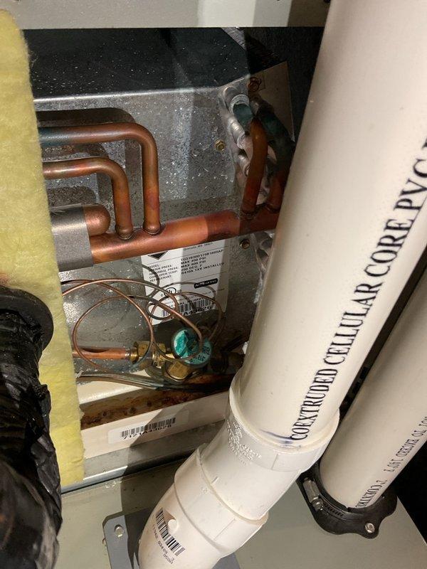 Completed comprehensive maintenance on 2019 Trane furnace including replacement of 16×25×1 air filter with tape pull handle, cleaning of flame sensor, verification of hot surface igniter operation, and inspection of blower wheel, drain trap, pressure switches, evaporator coil pan, and intake/exhaust piping with no operational issues identified. Discovered cellular-core (foam core) PVC venting material on both combustion air intake and exhaust piping, which is non-compliant with current Wisconsin building codes and manufacturer specifications for high-efficiency furnace installations; provided pricing for replacement of accessible exhaust section. Prepared separate estimate for burner removal and cleaning due to observed buildup during inspection.
