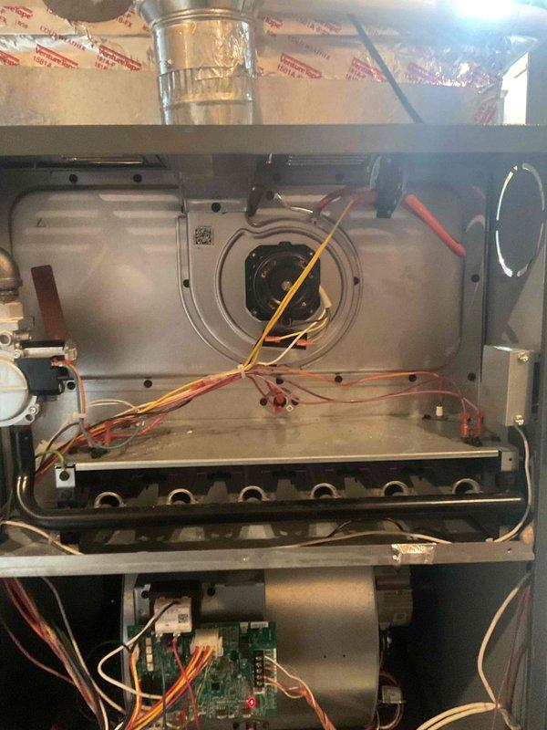Completed annual furnace tune-up and preventative maintenance inspection. Removed access panel and performed comprehensive system evaluation including blower assembly, burner operation, electrical connections, and control board functionality. All components operating within normal parameters with no deficiencies identified. Unit returned to service in proper working condition.