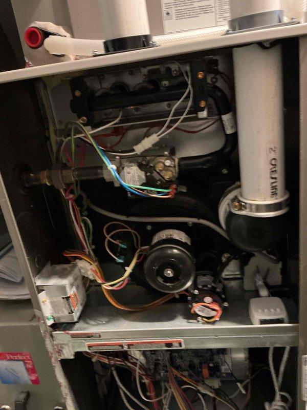 Completed comprehensive furnace tune-up on 3-year-old heat pump system currently operating on auxiliary heat. Performed thorough inspection and cleaning of flame rod, verified heat exchanger integrity with no rust or cracks present, and confirmed hot surface igniter within manufacturer specifications. Inducer motor amperage readings confirmed within acceptable range. Combustion analysis yielded carbon monoxide reading of 34 ppm and temperature rise of 55°F, both within normal operating parameters. All critical components inspected and system confirmed operational and safe for continued use.