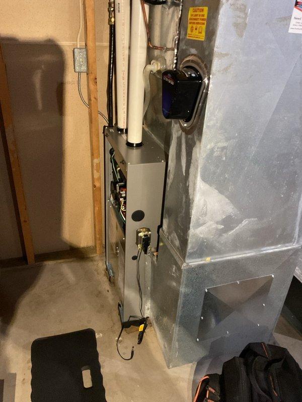 Completed return visit to diagnose furnace noise concerns following initial service two weeks prior. Removed blower housing to thoroughly inspect heat exchanger and blower wheel assembly, tightened all mounting hardware, and cleaned flame sensor. Cycled system through heat mode including second stage operation to verify proper function. All components operating normally with no abnormal sounds detected upon completion of service.