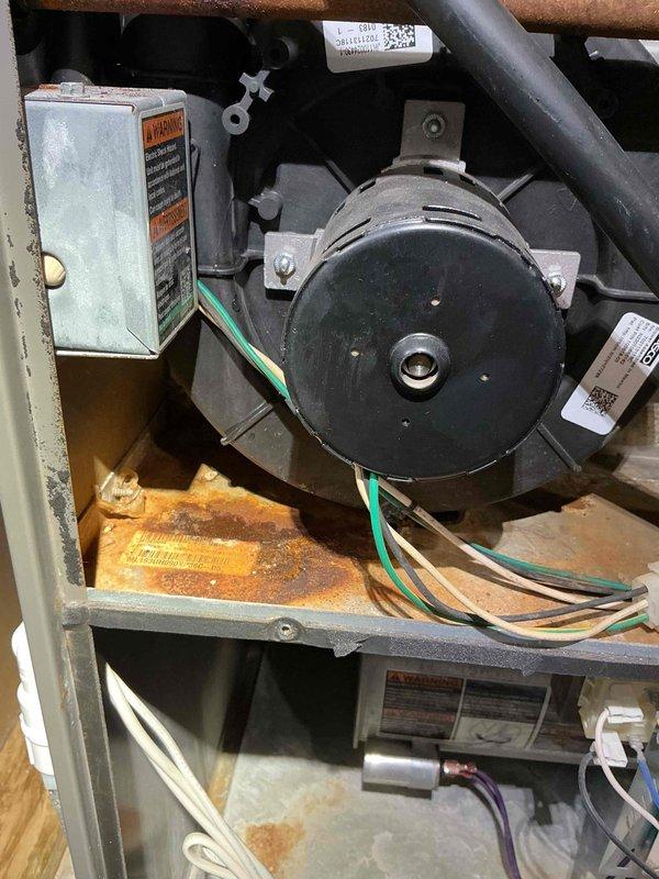 Completed annual furnace tune-up on a 13-year-old Lennox heating system. Cleaned flame rod and verified hot surface igniter ohms within acceptable range. Tested inducer motor amperage, confirmed operating within specifications. Inspection revealed minor rust present in heat exchanger, on gas pipe inside furnace cabinet, and on bottom panel near inducer motor assembly. Additional rust noted around evaporation drain pipe area, though drain pipe itself is PVC and in good condition. Informed customer of rust conditions found during inspection. All system components tested and operating properly at time of service completion.