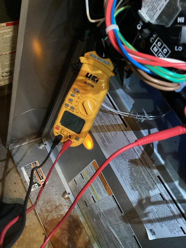 Completed annual fall heating maintenance on one gas furnace unit (10+ years old), one humidifier, and one GFP as part of recurring maintenance agreement. Performed comprehensive tune-up including visual inspection of heat exchanger, which revealed some rust buildup requiring ongoing monitoring. Conducted electrical diagnostics using digital multimeter to verify proper system operation and performed carbon monoxide testing to ensure safe operation despite heat exchanger surface corrosion. All components functioning within acceptable parameters at time of service, with recommendation for continued monitoring of heat exchanger condition.