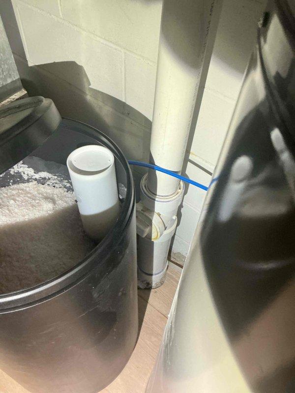 Completed biannual plumbing inspection including water heater tune-up and seasonal outdoor faucet service. Inspected water heater system, pressure gauge readings, and associated plumbing components. Identified anode rod requiring replacement and presented two solution options for corrective action.