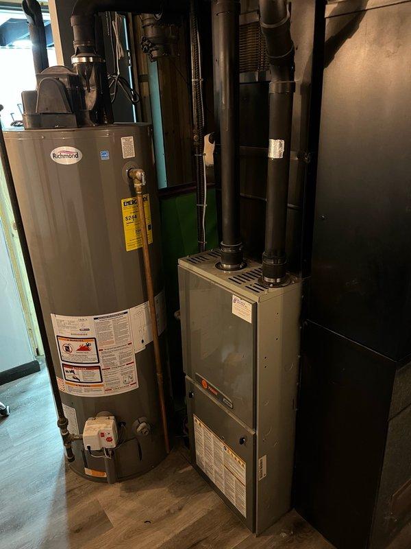 Completed routine furnace maintenance on 15-year-old Trane unit as part of membership agreement. All routine components tested within specification, system operated normally with 55° temperature rise during 15-minute operational test. Safety inspection revealed heat exchanger burner inlet showing early stage cracks not yet extending past riveting, and secondary heat exchanger displaying early signs of condensation leaking. While no immediate safety concern exists at this time, heat exchanger condition warrants monitoring and future replacement consideration. Recommended follow-up discussion regarding system condition and replacement pricing options.