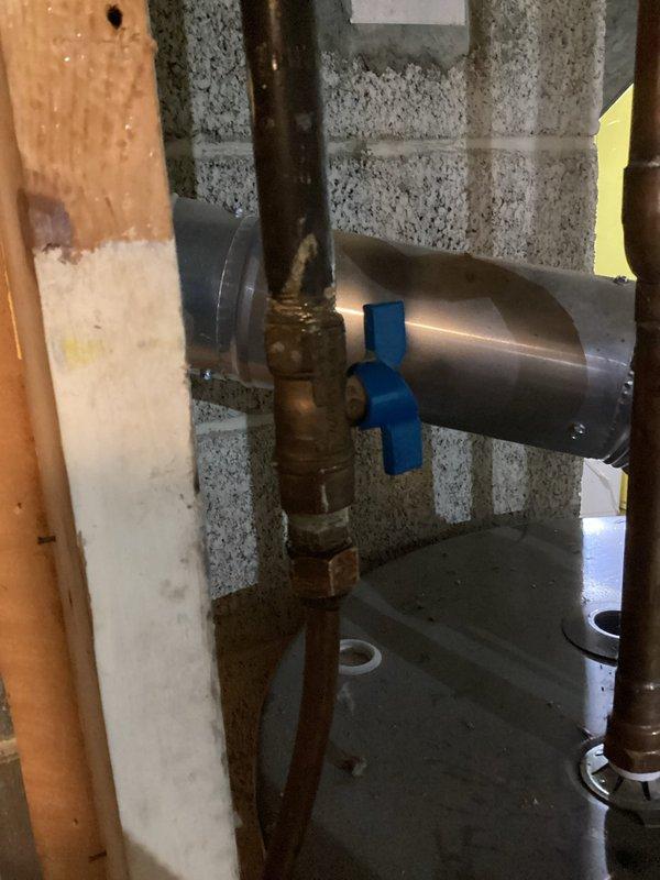 Responded to gas leak call at residential property with 20-year-old equipment. Successfully located and repaired gas leak on supply line serving water heater, restoring safe operation to that appliance. During inspection, identified additional gas leak at furnace traced to defective gas valve with missing component. Due to safety concerns and missing hardware on the valve assembly, furnace system was not returned to service. Provided quote for gas valve replacement required to restore furnace to safe operating condition.