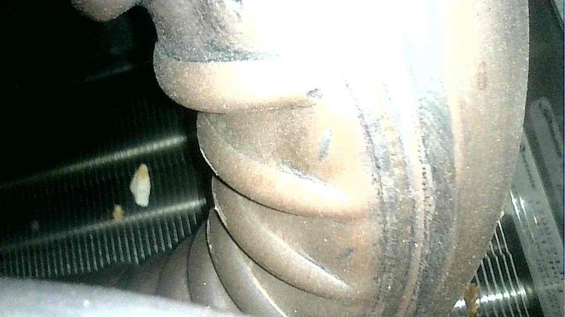 Completed comprehensive furnace tune-up on lower level heating system as part of HVAC maintenance agreement. Identified damaged gas valve wire during inspection and successfully replaced faulty wiring to restore safe operation. Performed standard maintenance procedures including system inspection, filter assessment showing heavy debris accumulation, and examination of heat exchanger components displaying normal aging and oxidation patterns.