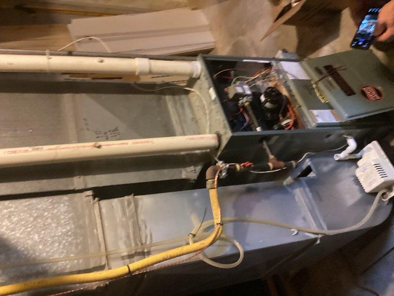 Responded to no cooling complaint and diagnosed failed PSC draft combustion inducer blower assembly and faulty pressure switch. Replaced both components to restore proper system operation. Initial replacement inducer motor was defective out of box, requiring procurement and installation of second unit to complete repair successfully.