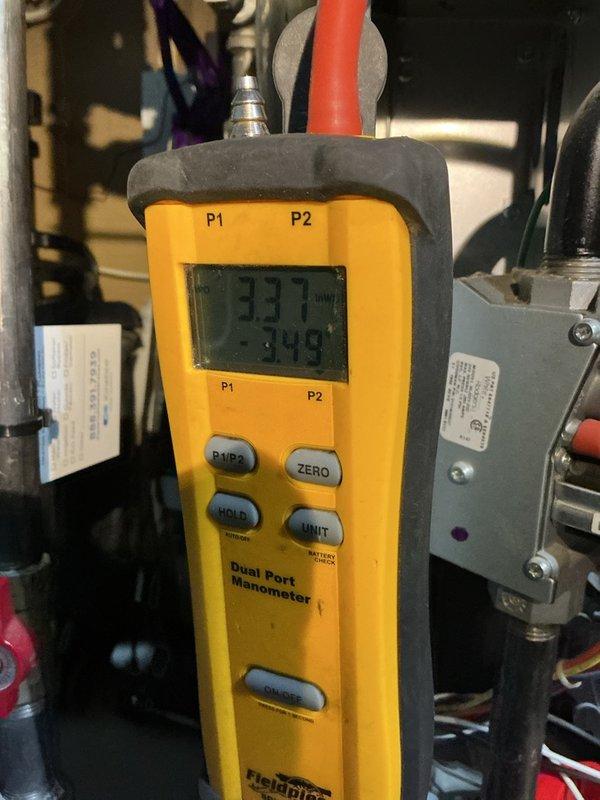 Completed comprehensive pre-winter maintenance on a 6-year-old Daikin furnace system. Performed full tune-up including flushing the condensation drain, cleaning the flame sensor, and conducting thorough inspection of heat exchanger, inducer motor, and blower motor—all components found in good working condition. Tested carbon monoxide levels at 16 ppm, which is within safe operating parameters. Verified air filter condition, confirmed proper operation of 2-zone motor system, and inspected ductwork with no abnormal sounds detected. Measured gas pressure at -0.45" W.C. and static pressure at 0.33" W.C. using dual port manometer to ensure optimal system performance. Despite initial customer concern regarding persistent ticking noise, no abnormal sounds were present during inspection. System tested, tuned, and confirmed ready for heating season.