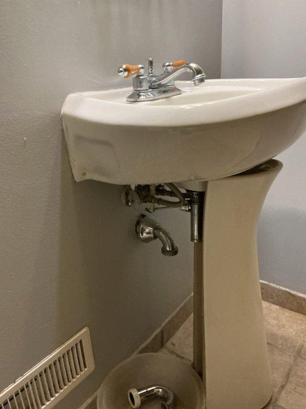 Responded to a lower level bathroom sink with complete drainage blockage. Upon arrival, found the trap had already been removed by the homeowner. Conducted diagnostic inspection of the pop-up assembly and visible drain components, finding no obstructions in the accessible areas, confirming the blockage was located further downstream in the drain line.

Deployed drain cable approximately 30 feet into the waste line to locate and clear the obstruction. Successfully extracted foreign material causing the stoppage. Reassembled all drain components including the P-trap and verified proper connections. Performed operational testing to confirm full drainage function and inspected all connections for leaks. System restored to normal operation with no leaks detected.