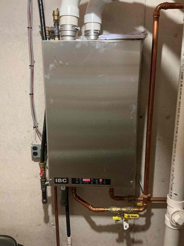 Installed Taco check valve in heating system pump to resolve heat leaching issue. Verified proper operation of check valve and confirmed elimination of unwanted heat transfer through the system. All components tested and functioning correctly upon completion.