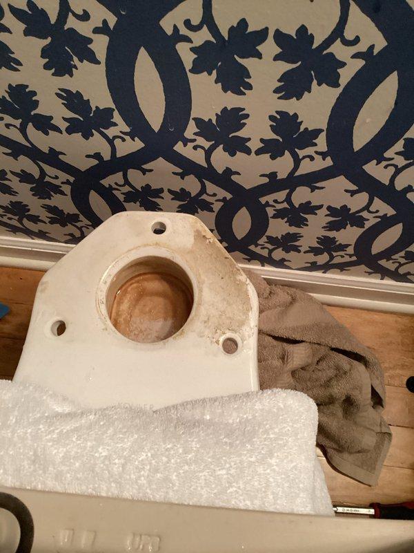Responded to a toilet leak complaint and identified the source as a failed tank-to-bowl gasket. Removed the tank from the bowl, replaced the deteriorated gasket, and performed a complete tank rebuild including internal flush valve components and fill valve mechanism. Reassembled the unit, tested for proper operation, and verified all connections were leak-free upon completion.