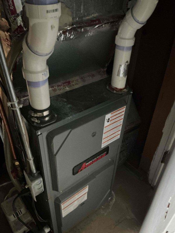Completed annual fall heating maintenance visit on Amana furnace unit and humidifier per preventative maintenance agreement. Performed comprehensive inspection including combustion analysis, which confirmed proper operation with O₂ levels at 8.3% and CO at 45 ppm. Verified all mechanical components, venting system, PVC condensate drainage, electrical connections, and refrigerant lines. Unit found operational with no deficiencies noted.