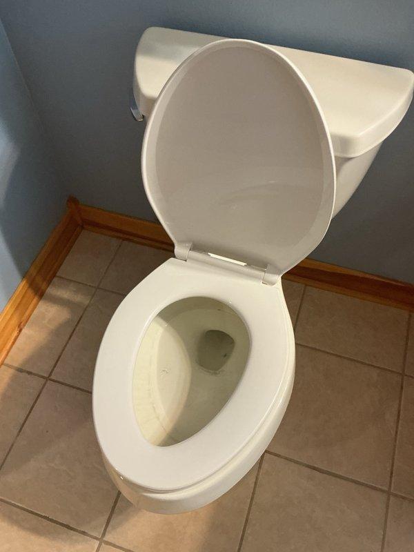 Responded to service call for toilet not flushing properly with recurring clogs requiring frequent plunging. Attempted to clear obstruction in downstairs toilet using hand auger but was unable to reach the clog due to depth or location of blockage. Additional visit scheduled for specialized equipment to address the persistent drainage issue. Also inspected water filtration system for reported leak, which had dried up prior to arrival, and found no active moisture or damage at time of inspection.