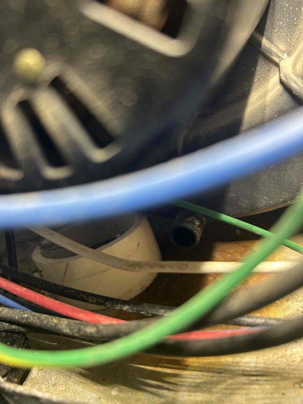 Completed heating tune-up on 20-year-old furnace and inspected 20-year-old AC system. Furnace appears functional but unable to perform heat exchanger camera inspection due to equipment malfunction. Provided homeowner instruction on humidifier operation and water panel replacement procedures. Evaluated AC unit that had failed to maintain setpoint on recent warm days; found R-22 refrigerant charge slightly low. Customer elected to defer AC repair until spring season.