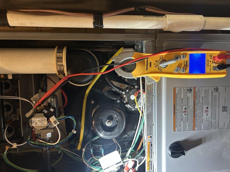 Completed scheduled heating maintenance as part of annual agreement. Performed comprehensive furnace inspection including temperature rise verification, gas pressure testing, and blower compartment examination. Replaced air filter, cleared condensate drain and trap, verified pressure switch ports, and cleaned flame sensor and igniter. All system components tested and confirmed operating within normal parameters.