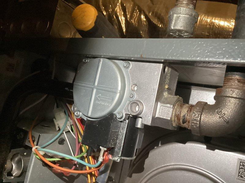 Performed furnace certification inspection for real estate transaction and city compliance. Conducted comprehensive system evaluation with no issues identified. Inspected blower motor assembly, electrical connections, and wiring harness—all components found in proper working condition. Verified Honeywell gas valve operation and examined all associated electrical terminations. Confirmed proper wire connections throughout system including control wiring and power supply circuits. Inspected ductwork and mounting components in attic installation. System passed certification requirements with all safety and operational parameters meeting code standards.