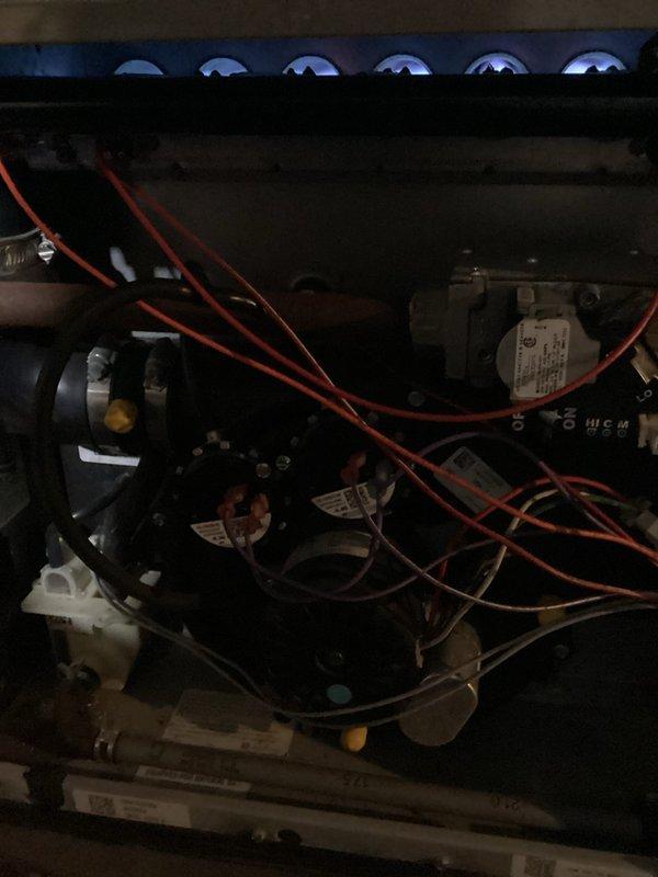 Completed furnace tune-up and maintenance inspection per agreement. System operating properly with safe combustion, verified by flue gas analysis showing acceptable CO levels at 46 ppm and proper oxygen readings. Burner flames burning blue and evenly distributed across all ports. Temperature splits within manufacturer specifications. Air filter inspected and found to have remaining service life. Identified concerns including basement condensation and potential mold growth in ductwork that will require further attention. All electrical connections, gas valve operation, and control components functioning correctly at time of service.