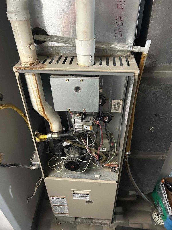 Completed scheduled heating maintenance visit on 2009 gas furnace unit as part of recurring preventive maintenance agreement. Performed comprehensive heating tune-up including inspection of blower assembly, which showed accumulated dust and debris around centrifugal fan hub and blades, burner components, heat exchanger, gas valve connections, electrical controls, and venting system. All systems tested and operating within normal parameters with no deficiencies requiring correction at this time.
