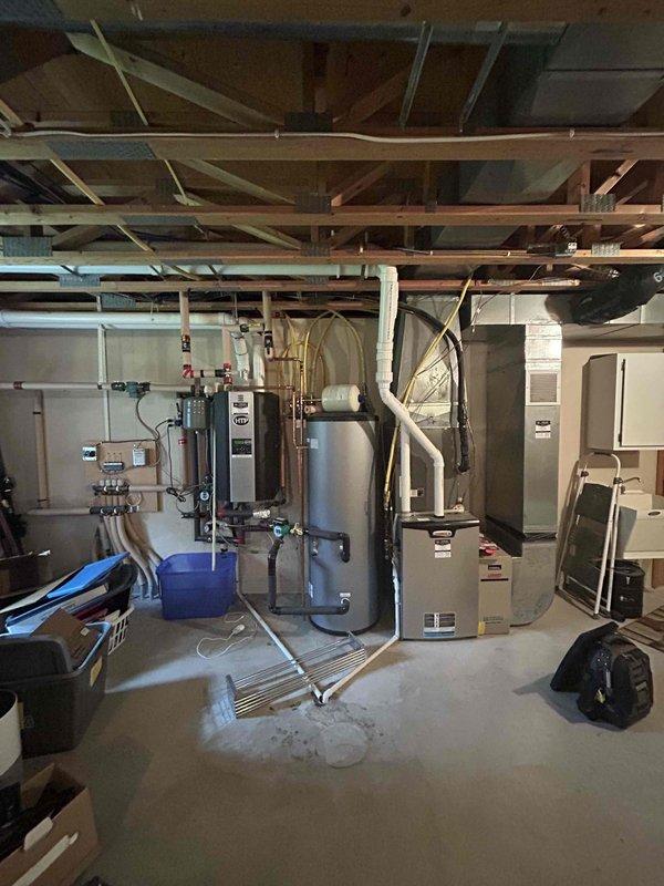 Completed scheduled heating maintenance agreement service including comprehensive inspection of furnace and boiler system. Performed full diagnostic testing on furnace with all components verified to be operating within manufacturer specifications. Conducted thorough evaluation of boiler system including testing all three heating zones and domestic hot water production. Confirmed proper firing sequence and verified boiler operating at 100% capacity. Inspected boiler vent piping with camera scope to ensure clear pathways following homeowner's removal of bird nest obstruction. All system components, safety controls, and zone valves functioning properly with no deficiencies noted.