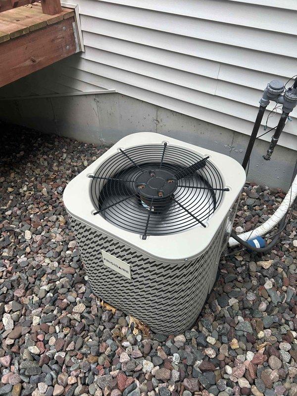 Responded to customer concern regarding carbon monoxide safety after neighboring property had furnace issues. Performed comprehensive furnace inspection and discovered inducer assembly completely filled with water. Found one mounting screw severely corroded and snapped off. Observed extensive rust accumulation beneath inducer assembly and on burner components. Conducted heat exchanger scope inspection which revealed multiple breach points indicating heat exchanger failure.

Due to severity of findings and carbon monoxide risk, immediately shut down furnace for safety. Disconnected inducer motor, unplugged igniter, and closed gas valve at appliance and main gas shutoff. Left blower operational to maintain air circulation capability for comfort. Provided repair estimates and scheduled appointment for replacement system consultation.

Additionally inspected air conditioning system which showed normal operating condition with no concerns noted. Enrolled customer in annual maintenance progr