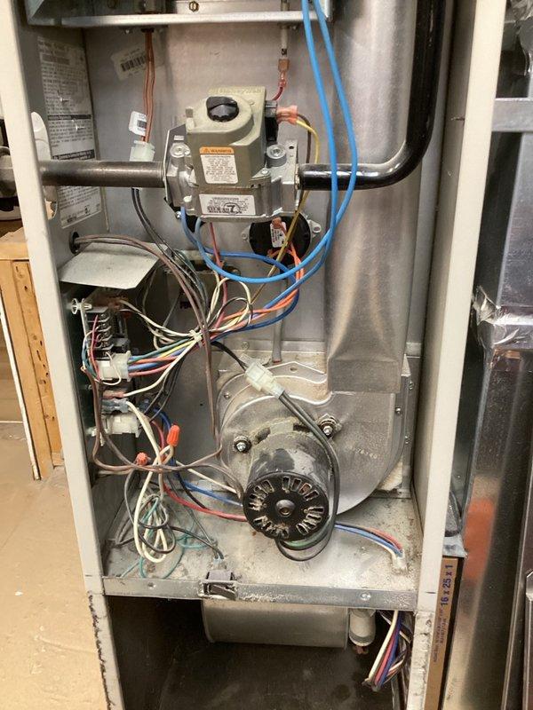 Performed comprehensive furnace tune-up on 25-year-old heating system with no reported issues. Conducted thorough inspection of all major components including venting, exhaust flue, burners, blower assembly, inducer motor, pressure switch, safety switches, and limit switches. Performed camera inspection of heat exchanger to assess for cracks or deterioration. Tested flame sensor and igniter functionality, verified proper gas pressures, and confirmed adequate combustion air supply. Cycled system through multiple heating cycles to verify safe and proper operation. All components found to be functioning within normal parameters and system confirmed operational.