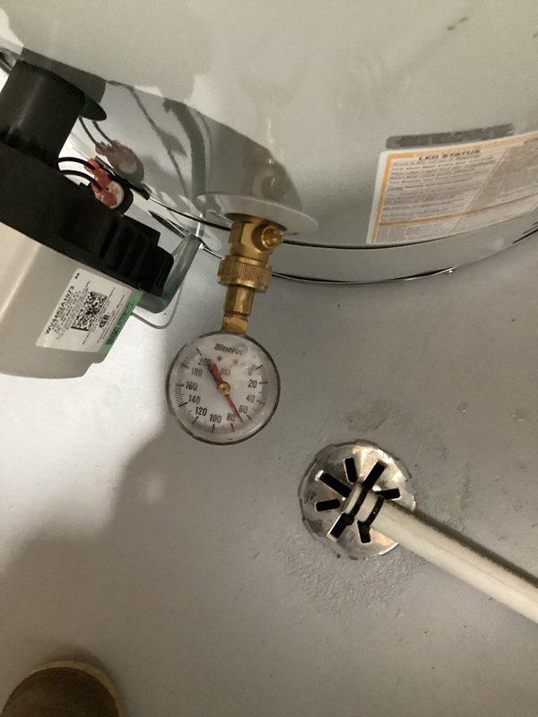 Installed pressure reducing valve to regulate excessive system pressure in residential plumbing system. System pressure measured over 100 PSI, which exceeds safe operating levels and can damage fixtures, appliances, and piping. Successfully reduced and stabilized pressure to 70 PSI through PRV installation, bringing system within optimal operating range of 50-75 PSI for household plumbing protection and longevity.