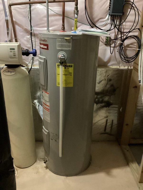 Responded to no hot water complaint and found 18-year-old A.O. Smith tank water heater had failed and was no longer operational. Replaced old water heater with new unit, reconnected all plumbing lines including copper supply pipes and installed proper venting. System tested and restored full hot water service to residence.