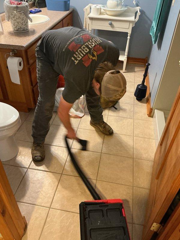Responded to a downstairs toilet backing up and unable to drain properly. Attempted to clear the obstruction with a closet auger but was unsuccessful due to the severity of the blockage. Removed and replaced the existing toilet with a new unit. During the process, discovered the inlet of the tank was plugged with debris, which was cleared before installing the replacement fixture. Completed floor cleanup and ensured all plumbing connections were secure and functioning properly.