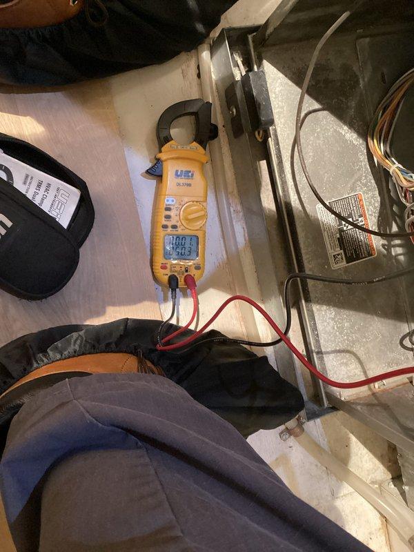 Completed scheduled Family Rewards heating maintenance visit on Carrier furnace system. Performed comprehensive system inspection including electrical diagnostics with digital multimeter, verifying proper amperage draw and voltage readings. Documented equipment make, model, and serial number information with photographs as requested. All components operating within normal parameters with no deficiencies noted at time of service.
