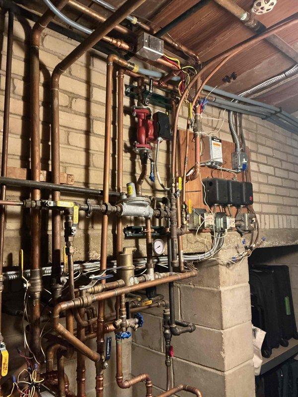 Performed comprehensive seasonal maintenance and inspection on 3-year-old Burnham boiler system. Conducted thorough examination of all system components including piping network, backflow preventer, pressure relief valve, and system pressure levels. Verified proper operation of all circulation pumps and confirmed functionality across all heating zones. Inspected burner assembly for cleanliness and proper operation. Evaluated heat exchanger condition and confirmed optimal performance. Tested all radiators throughout the home to ensure proper heat distribution. Performed complete combustion analysis to verify safe and efficient operation. All system components found to be functioning properly with no leaks detected in piping or connections. All safety devices operating within normal parameters. System confirmed to be operating safely and efficiently with no corrective actions required at this time.