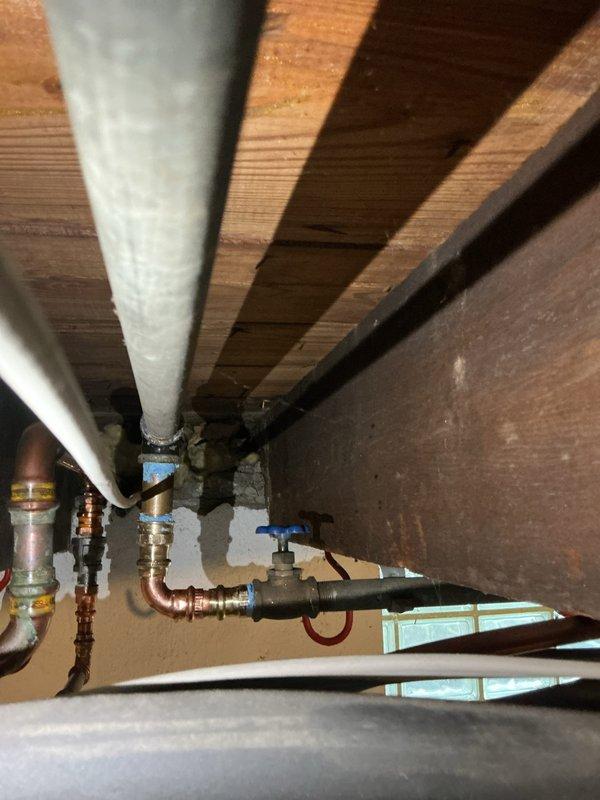 Responded to water leak emergency in basement where a pin hole leak was discovered in a galvanized high-pressure pipe. Isolated the affected line by shutting off water supply to that specific pipe section, then performed repair on the damaged galvanized piping to restore system integrity. Also completed a toilet repair earlier during the same service visit.