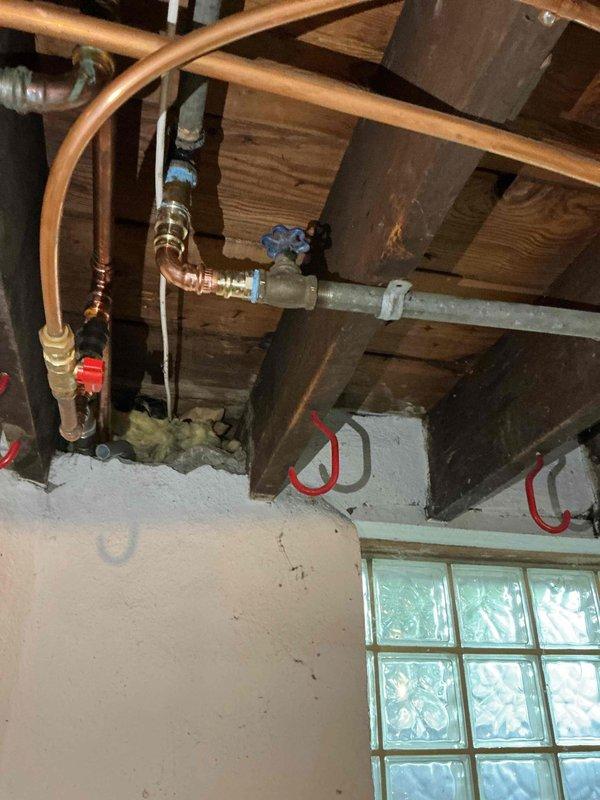 Responded to water leak emergency in basement where a pin hole leak was discovered in a galvanized high-pressure pipe. Isolated the affected line by shutting off water supply to that specific pipe section, then performed repair on the damaged galvanized piping to restore system integrity. Also completed a toilet repair earlier during the same service visit.