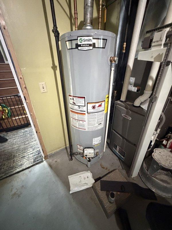 Completed return visit to install replacement thermopile on A.O. Smith ProMax standard vent water heater. The thermopile had been previously identified as defective during initial diagnostic visit and was replaced under warranty coverage. Installation was completed successfully, restoring proper pilot flame sensing and thermocouple functionality to the unit.