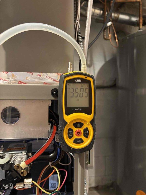 Performed comprehensive maintenance on newly installed 2026 furnace system. Conducted full system inspection including thermostat operation, air filter condition, condensate drain, blower motor, inducer motor, capacitor, and electrical wiring connections—all components verified operational. Evaluated temperature split across system and confirmed within acceptable parameters. Inspected critical furnace components including heat exchanger for cracks or deterioration, hot surface igniter, flame sensor, and measured gas supply pressure—all readings normal. Replaced 5-inch media filter as part of maintenance service. Homeowner advised this would be the final complimentary filter replacement and future filter changes would incur standard service charges. Documented outdoor AC installation concern requiring follow-up attention and submitted separate service request form for resolution. System operating normally with no deficiencies noted at time of service completion.