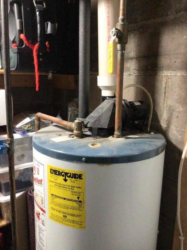 Completed furnace tune-up on 12-year-old residential heating unit. System operational with normal performance parameters. Identified two code violations requiring correction: high voltage wiring terminated with wire nuts and left unsecured inside cabinet, and flexible metal gas connector improperly installed directly to gas valve without proper fittings. Documented conditions with photos and provided estimate for code compliance repairs including proper junction box installation and gas line correction with appropriate connectors and fittings.