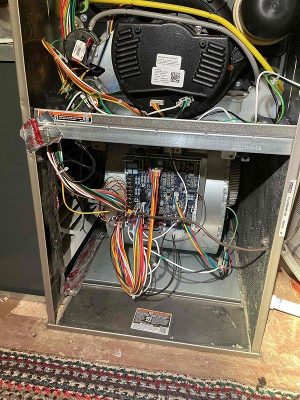 Completed comprehensive maintenance agreement service on residential HVAC system consisting of a 5-year-old gas furnace and 15-year-old heat pump. Performed thorough tune-up on furnace including flame rod cleaning, heat exchanger inspection confirming no rust or cracks, verified inducer motor amperage within specifications, tested ECM motor operation, measured carbon monoxide at 17 ppm, and confirmed temperature rise at 54°F. Conducted heat pump maintenance including component box inspection, capacitor testing within specifications, verified contactor replacement from earlier this season, confirmed low voltage amperage readings acceptable, inspected coils finding them clean, and measured temperature differential at 19°F. Both heating and cooling systems operating properly with all safety and performance parameters meeting manufacturer specifications.