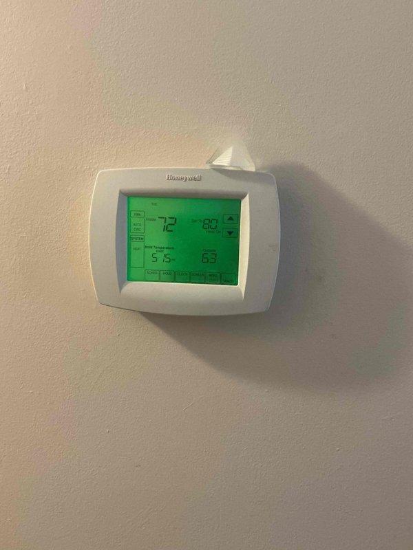 Completed comprehensive maintenance agreement service on residential HVAC system consisting of a 5-year-old gas furnace and 15-year-old heat pump. Performed thorough tune-up on furnace including flame rod cleaning, heat exchanger inspection confirming no rust or cracks, verified inducer motor amperage within specifications, tested ECM motor operation, measured carbon monoxide at 17 ppm, and confirmed temperature rise at 54°F. Conducted heat pump maintenance including component box inspection, capacitor testing within specifications, verified contactor replacement from earlier this season, confirmed low voltage amperage readings acceptable, inspected coils finding them clean, and measured temperature differential at 19°F. Both heating and cooling systems operating properly with all safety and performance parameters meeting manufacturer specifications.
