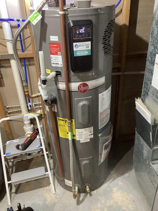 Responded to high temperature alarm (T005 alert) on Rheem electric water heater under manufacturer warranty. Unit was triggering scalding temperature warnings due to faulty thermistor on the evaporator line. Manufacturer had previously supplied replacement thermistor kit for this known issue. Accessed unit controls, removed defective thermistor sensor, and installed new OEM thermistor component. Verified proper sensor operation, confirmed temperature readings returned to normal parameters at 120°F setpoint, and cleared alarm codes from system. Unit tested and operating within specifications upon completion.