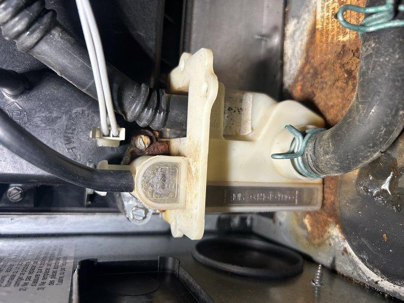 Completed routine maintenance tune-up on 5-year-old furnace under membership agreement. Performed comprehensive system testing and operation verification. Identified and addressed condensate trap leakage by removing, cleaning, and re-securing the trap assembly, then monitored system operation to confirm leak resolution. Verified temperature rise within specifications, inspected heat exchanger and coils for integrity, and tested all system components with satisfactory results. Air filter noted as nearing replacement interval. Advised monitoring condensate trap for any recurring moisture issues and to report if leakage reappears.