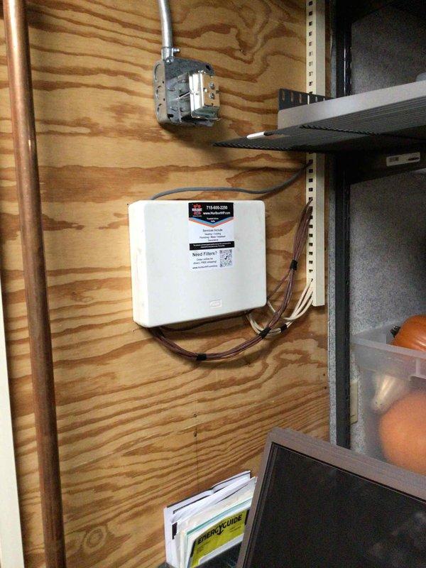 Replaced Honeywell steam humidifier canister and collector box/cold end header box on residential HVAC system. Installed new cold header assembly and steam humidifier filter, verified all electrical connections to blower motor assembly, and confirmed gas burner operation. System tested and operating within normal parameters upon completion.