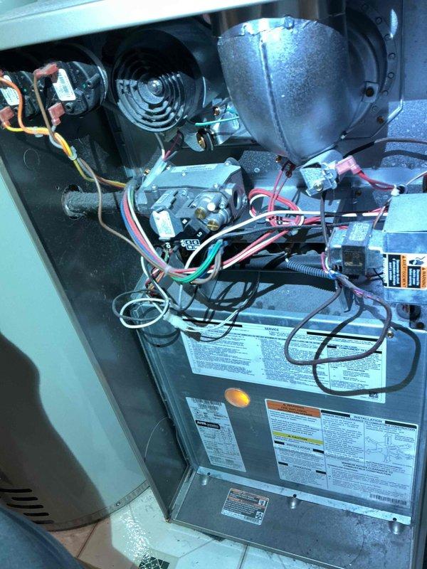 Completed comprehensive furnace maintenance on a 6-year-old Carrier heating system as part of a recurring maintenance agreement. Performed thorough inspection and cleaning of critical components including flame rod and heat exchanger, confirming no rust or crack development. Verified hot surface igniter resistance within manufacturer specifications and confirmed inducer motor amperage operating within acceptable parameters. Measured temperature rise at 38 degrees, indicating proper combustion and airflow. Inspected furnace filter finding it in clean condition. Conducted combustion analysis with carbon monoxide reading at 52 PPM. All system components tested and verified operational with unit heating properly at time of service completion.