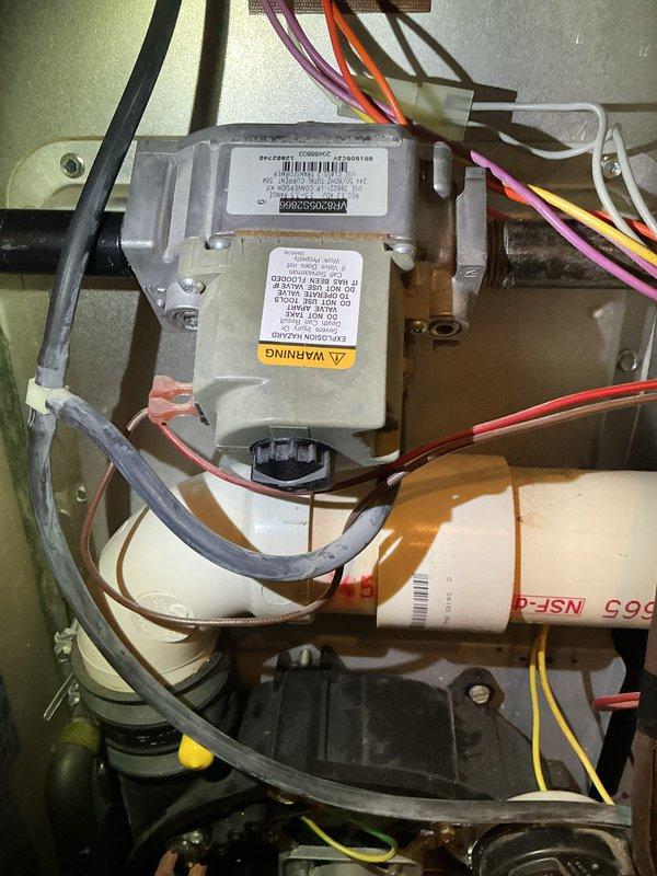 Completed routine heating maintenance on 21-year-old furnace system in duplex unit. Inspected gas valve assembly, verified all electrical connections, checked combustion components, and replaced air filter. Noted inducer motor producing excessive noise during operation and recommended draft motor replacement; comfort advisor scheduled for follow-up assessment of aging system.