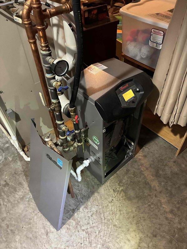 Completed preventive maintenance on 10-year-old boiler system under heating maintenance agreement. Verified operational status of all heating zones, confirmed proper function of circulation pumps, and checked expansion tank condition. Cleaned spark rod and flame sensor to ensure reliable ignition, and flushed condensate trap to maintain proper drainage. Camera inspection of heat exchanger revealed significant buildup accumulation that will require professional cleaning and flushing to maintain optimal efficiency and prevent potential performance issues. Provided estimate for recommended heat exchanger service to address identified condition.