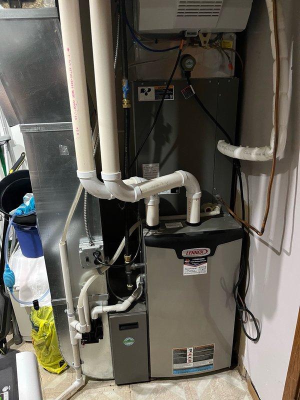 Completed annual furnace tune-up on Lennox heating system. Performed comprehensive inspection per maintenance specifications, finding filter and humidifier pad recently replaced and all components clean and within manufacturer specifications. Tested furnace operation for 15 minutes, confirming proper functionality with 60° temperature rise across heat exchanger. All systems operating normally with no deficiencies noted.