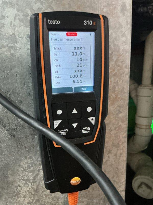 Completed seasonal furnace maintenance on 21-year-old Gibson unit operating as secondary heat source to wood boiler. Combustion analysis revealed acceptable parameters with O2 at 11.0%, CO at 10 ppm, and CO2 at 6.55%. Inspection identified draft inducer motor drawing elevated amperage and blower motor exhibiting oil leakage at bearings, both components showing age-related wear consistent with equipment lifespan. Recommended replacement of both motors and comfort advisor consultation for system evaluation given advanced age of equipment.
