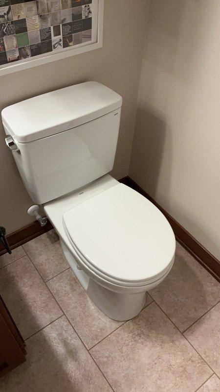 Completed installation of two standard height toilets in residential bathrooms. Each installation included new wax ring seals and closet bolts to ensure proper mounting and watertight connections. Both two-piece porcelain toilets were set on existing tile flooring with secure anchoring to the floor flange, tested for proper operation and verified leak-free performance.