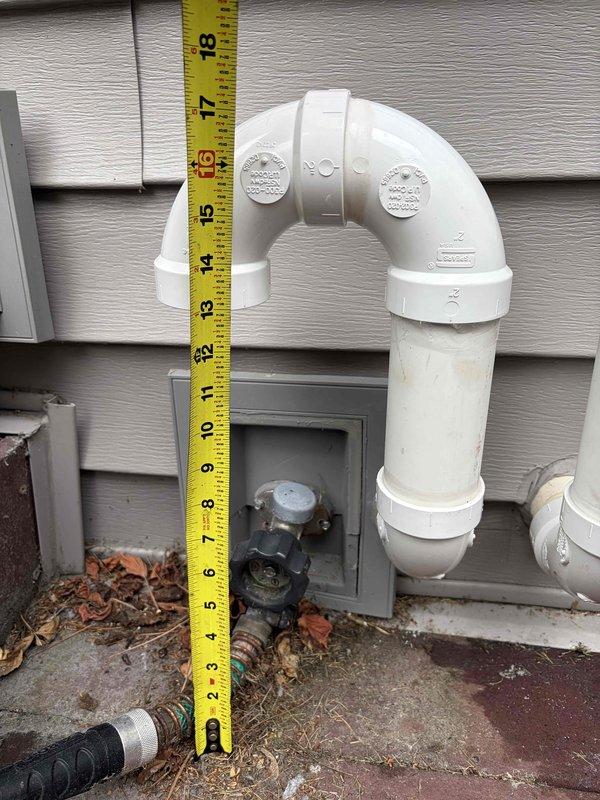 Responded to code correction callback for HVAC intake venting that did not meet SPS 323.13 (3)(b) requirements. Installed snorkel extension on intake pipe to achieve minimum 12-inch clearance above grade level. Reconfigured venting terminations on exterior wall using proper PVC fittings and mounting brackets. Verified all terminations are properly secured to siding and meet code specifications. Documented completed work with photographs showing measuring tape confirmation of proper clearance height for inspector submission.