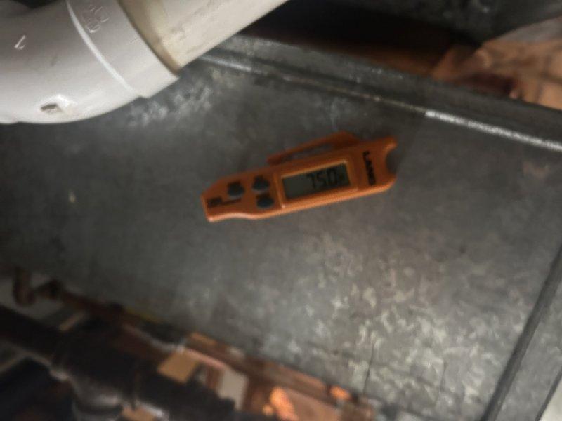 Performed comprehensive furnace maintenance on Unit 5x2698 as part of membership agreement. Adjusted blower airflow setting from 18% above factory default down to 6% above factory default per homeowner request, with option to reduce further to factory specification if needed. Cleaned flame sensor and inspected igniter for proper operation. Cleared condensate drain line to ensure proper drainage. Verified air filter condition, which was replaced in April and remains serviceable. Checked control board for diagnostic codes and found none present. Tested all furnace operations and confirmed system is functioning within normal parameters.